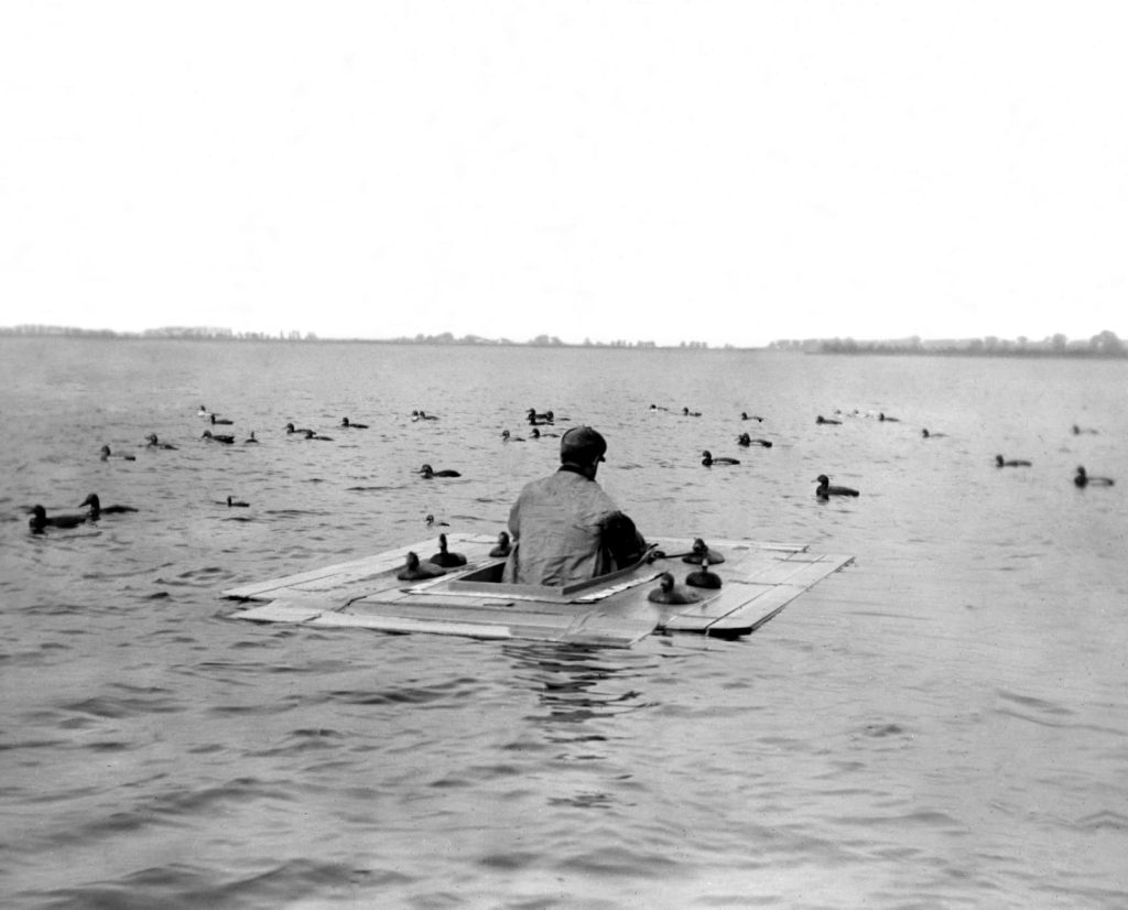 A single cockpit rig circa 1918, Miles River on the Chesapeake Bay, showing iron ballast deck decoys.