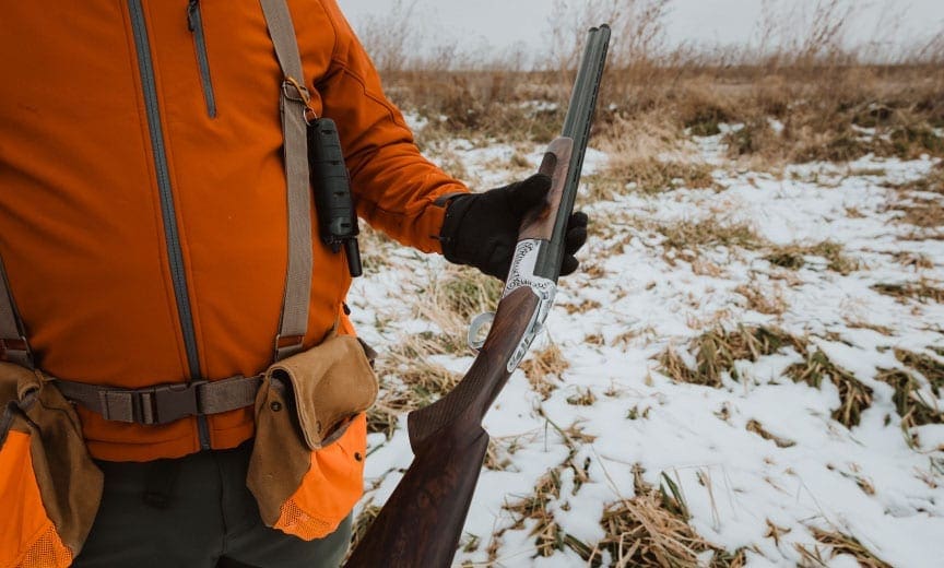 CZ USA Marketing Director inspecting the barrel legth on a shotgun