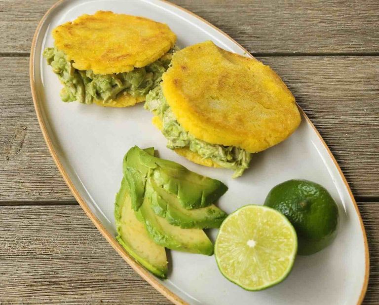Reina pepiada made with chukar and stuffed into fried dough arepas