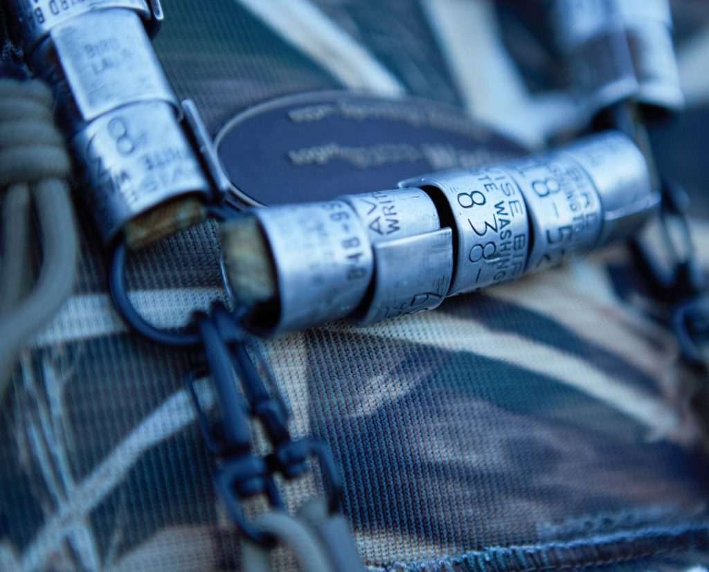 A duck hunter with duck bands on his lanyard.
