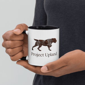 Griffon-Mug-Lifestyle-Shot A man holding a wirehaired pointing griffon coffee mug.
