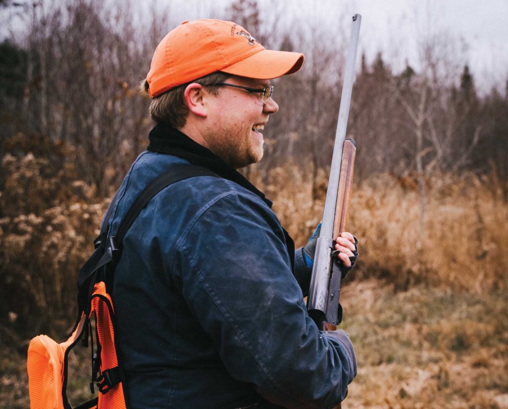 A hunter carries a Browning Auto 5 Humpback