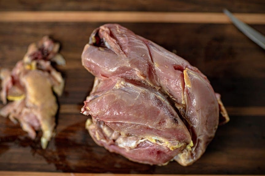 Raw pheasant meat with freezer burned sections trimmed off