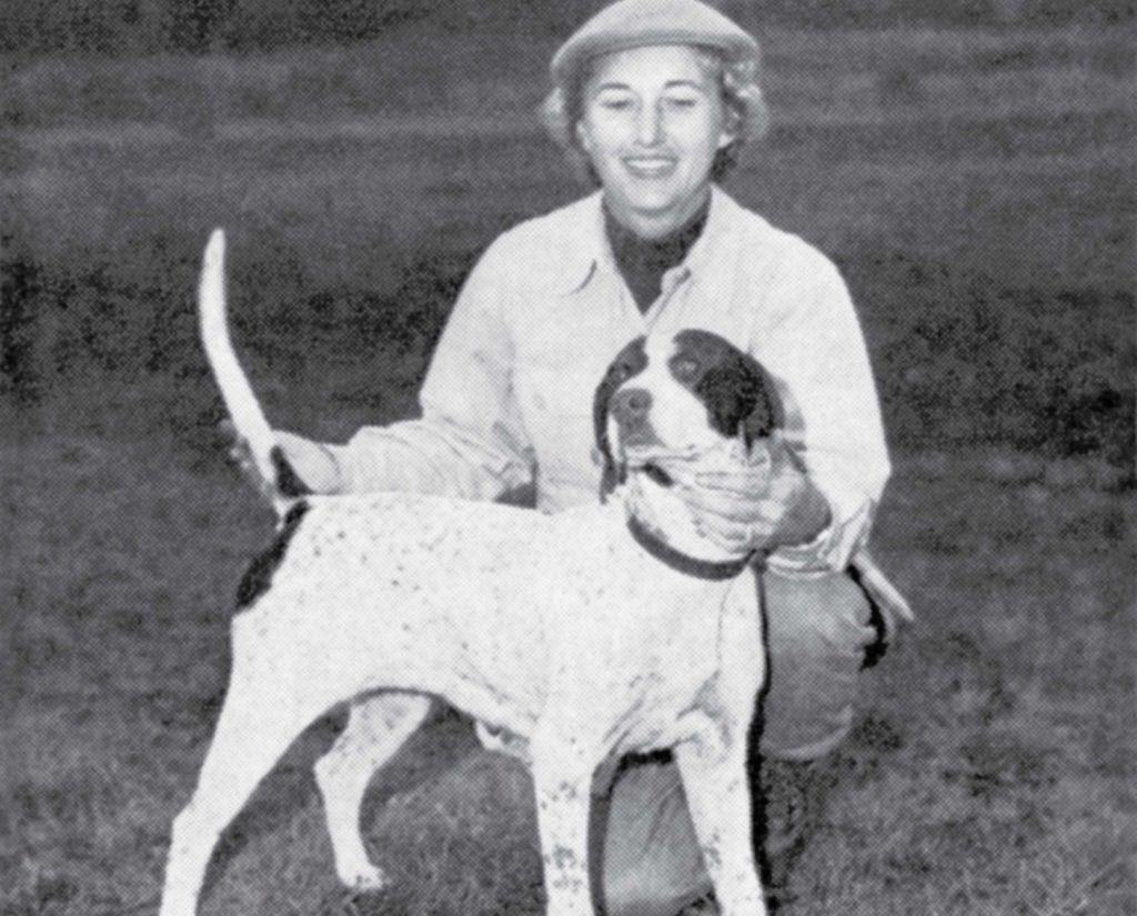 Matilda Nitchman shows one of her pointing dogs