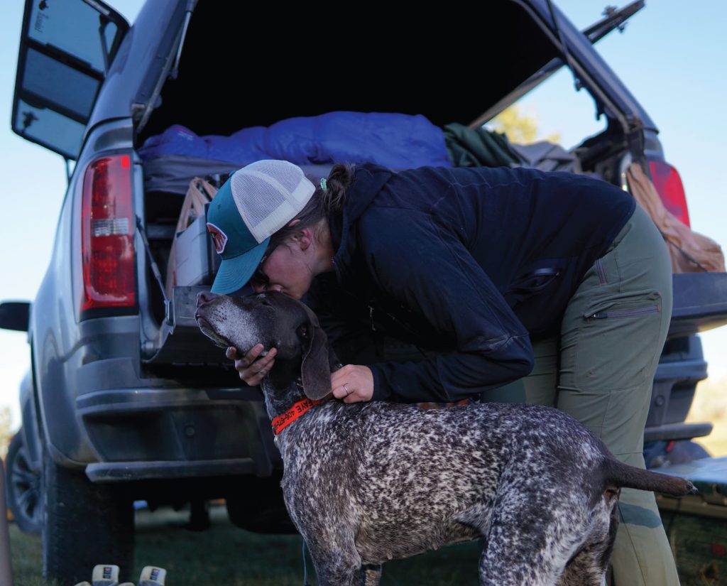 The author, a Montana resident, with her bird dog.