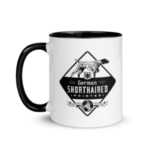 An 11oz ceramic mug featuring a GSP dog