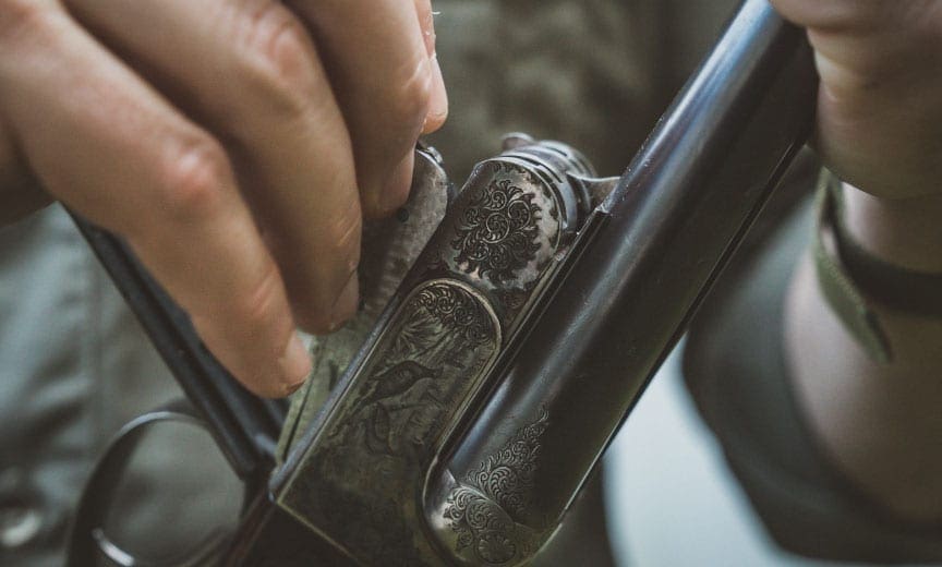 Disassembling a vintage shotgun