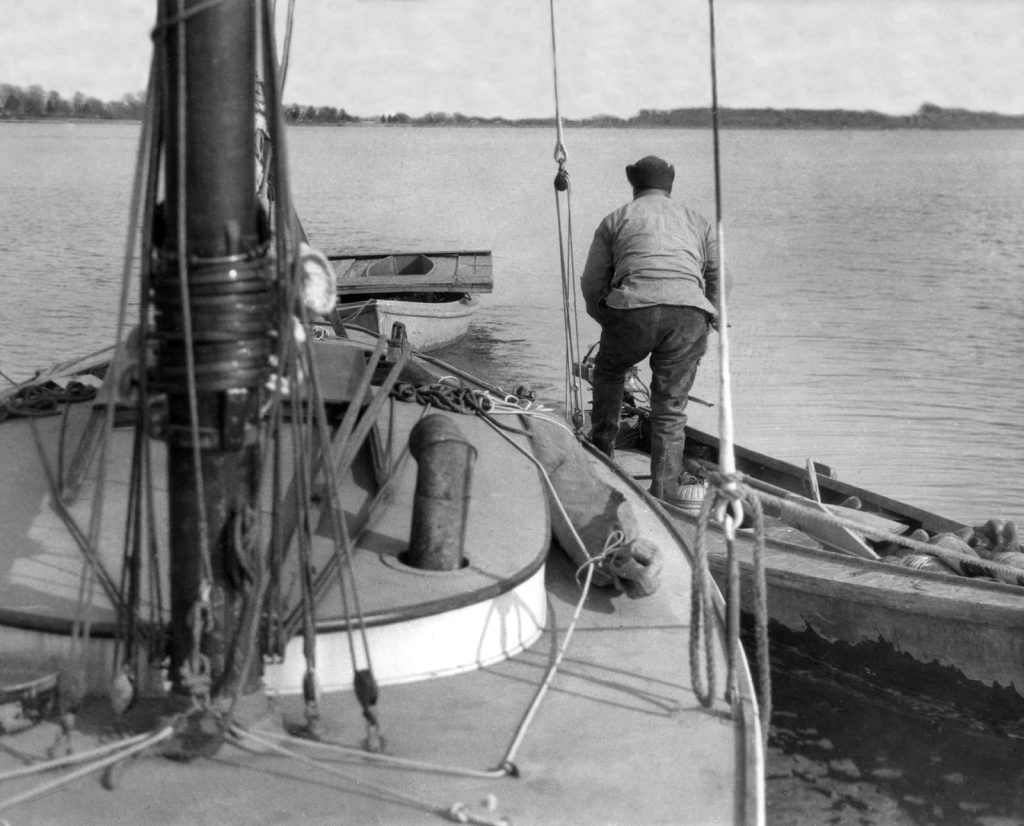 lay boat is fitted with an inboard engine, and the dory has an early vintage outboard.