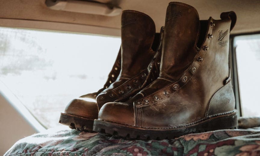 Leather boots warming up in a car.